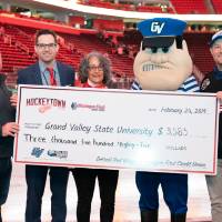 A photo displaying the amount that was raised for the GVSU Scholarship Fund at the Detroit Red Wings GVSU Night